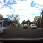 Car waiting to turn across traffic
